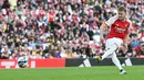 Arsenal menang lewat adu penalti dengan skor 5-4 setelah bermain imbang 1-1 selama 90 menit. (AFP/Glyn Kirk)