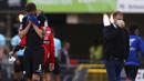 Pemain SC Paderborn 07, Christian Strohdiek, tampak sedih usai ditaklukkan Borussia Dortmund pada laga Bundesliga di Stadion Benteler, Minggu (31/5/2020). Borussia Dortmund menang dengan skor 6-1 SC Paderborn 07. (AP/Lars Baron)
