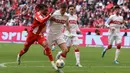 Hal itu didapat setelah Die Roten menang 4-2 atas VfB Stuttgart dalam laga pekan ke-30 yang berlangsung di Allianz Arena, Munchen. (AFP/Alexandra Beier)