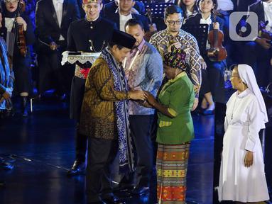 Presiden Republik Indonesia, Prabowo Subianto saat menghadiri acara Perayaan Natal Nasional 2024 di Indonesia Arena, Kompleks Gelora Bung Karno (GBK), Jakarta, Sabtu (28/12/2024). (Liputan6.com/Herman Zakharia)