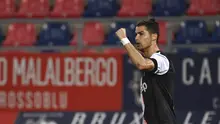 Striker Juventus, Cristiano Ronaldo, melakukan selebrasi usai membobol gawang Bologna pada laga Serie A di Stadion Renato Dall'Ara, Senin (22/6/2020). Juventus menang 2-0 atas Bologna. (AP/Massimo Paolone)