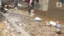 <p>Kondisi pasca banjir bandang Garut di kawasan Cimacan, Desa Jayaraga, Kecamatan Tarogong Kidul, Sabtu (16/7/2022). Hasil perhitungan sementara, total sekitar 2.500 warga dari 700 Kepala Keluarga (KK) menjadi korban terdampak banjir Garut kali ini. (Liputan6.com/Jayadi Supriadin)</p>
