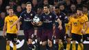 Arsenal berhasil menipiskan kekalahan pada laga lanjutan Premier League yang berlangsung di Stadion Molineux, Wolverhampton, Kamis (25/4). Arsenal kalah 1-3 kontra Wolves. (AFP/Paul Ellis)