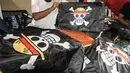Sebagian menganggap pengibaran bendera One Piece sebagai bentuk kritik yang diekspresikan secara simbolik terhadap pemerintah. (DIKA/AFP)