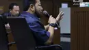 Terpidana korupsi e-KTP, Setya Novanto menjawab pertanyaan saat menjadi saksi dalam kasus dugaan suap proyek PLTU Riau-1 dengan terdakwa, Sofyan Basir yang juga mantan Dirut PLN di Pengadilan Tipikor, Jakarta, Senin (12/8/2019). Sidang mendengar keterangan saksi. (Liputan6.com/Helmi Fithriansyah)