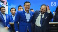 Ketua Umum Partai Demokrat Agus Harimurti Yudhoyono (AHY) dan dengan Ketua Umum Partai NasDem Surya Paloh saat jumpa pers di DPP Partai Demokrat, Jakarta, Rabu (22/2/2023). Dalam pertemuan tertutup tersebut, AHY menyampaikan harapannya terhadap Koalisi Perubahan dan memastikan Koalisi Perubahan saat ini sudah berada pada tahap finalisasi. (Liputan6.com/Faizal Fanani)
