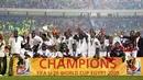 Tim Ghana berpose setelah menjuarai FIFA PD U-20 di Kairo, Mesir. Ghana mengalahkan Brasil melalui adu penalti 4-3 di final, 16 Oktober 2009. AFP PHOTO/CRIS BOURONCLE