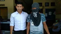 Pelaku Pembunuhan di Kendari, masih berusia remaja saat ditangkap polisi, Kamis (7/11/2019). (Liputan6.com/Ahmad Akbar Fua)