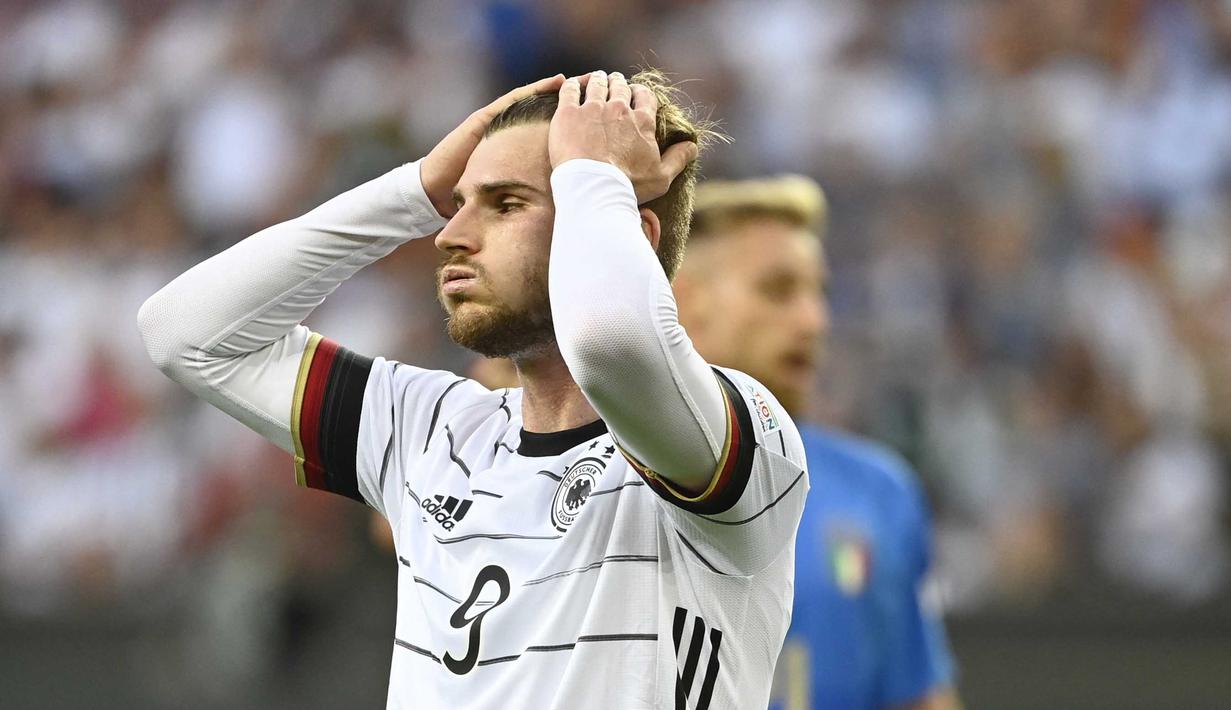 Timo Werner memutuskan balik ke RB Leipzig dari Chelsea agar bisa tampil reguler serta mengembalikan ketajamanya dan yang pasti dipanggil Hansi Flick memperkuat tim Panser. Sayangnya ia kemudian bernasib apes lantaran mengalami cedera dan harus rela menonton Piala Dunia 2022 dari tv saja. (AFP/Ina Fassbender)
