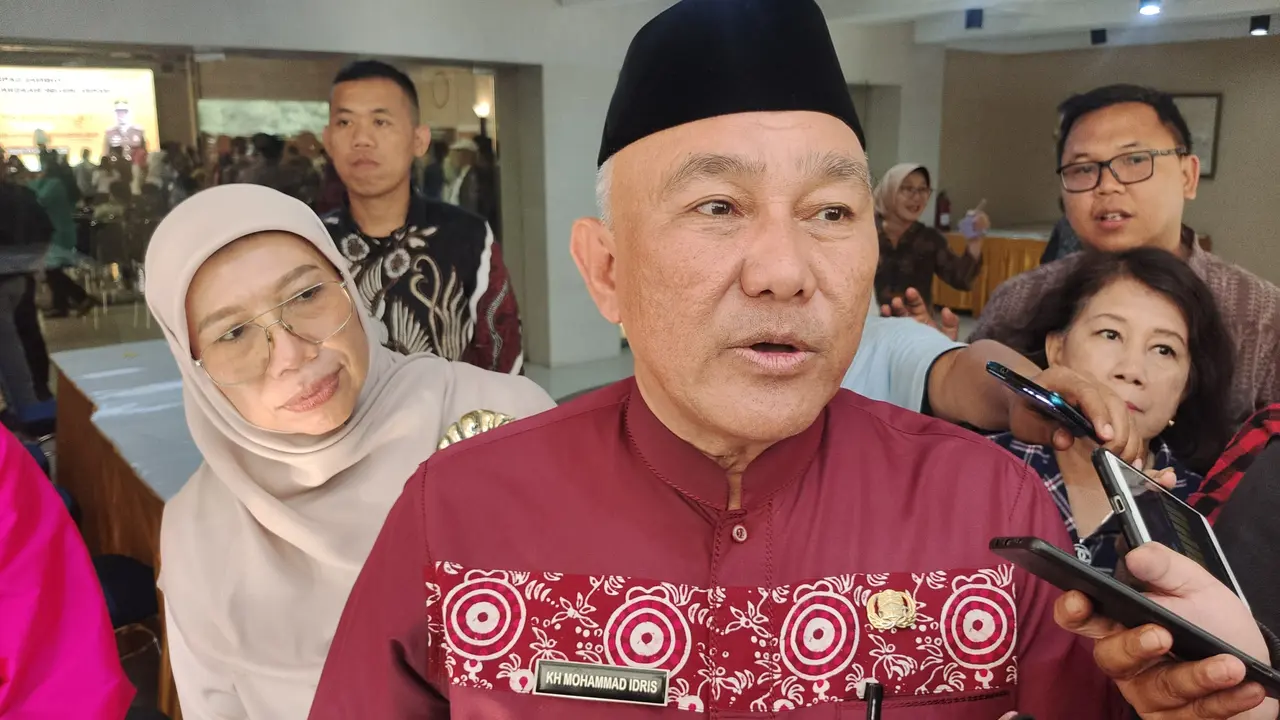 Wali Kota Depok, Mohammad Idris usai mengikuti kegiatan di wilayah Beji, Depok.