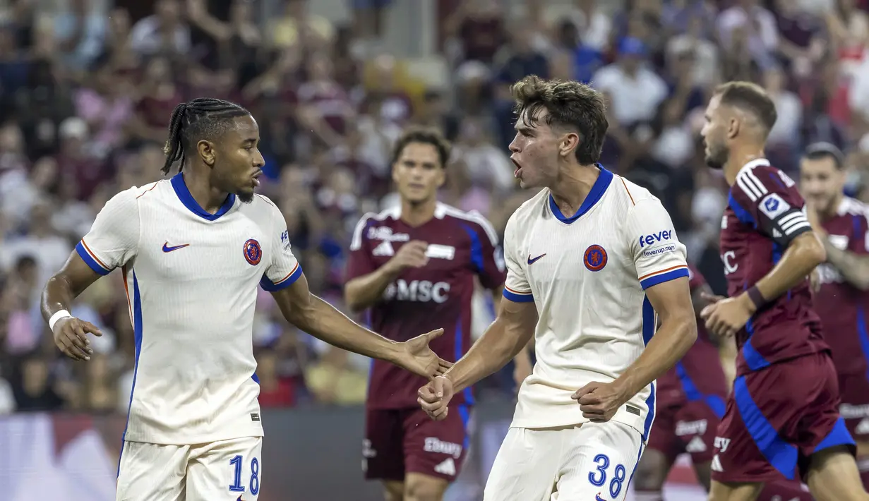 Christopher Nkunku membawa The Blues unggul lewat eksekusi penalti pada babak pertama. (Laurent Gillieron/Keystone via AP)