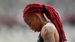 Michelle-Lee Ahye dari Trinidad and Tobago memenangkan seri lari 100 meter putri Olimpiade Tokyo  2020 di Tokyo, Jepang, 30 Juli 2021. (AP Photo/Petr David Josek)