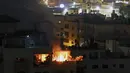 Serangan udara Israel menewaskan sembilan orang sebelum fajar 9 Mei 2023 di Jalur Gaza, menurut kementerian kesehatan wilayah yang dikuasai Hamas. (AFP/Mohammed Abed)