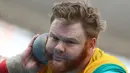Atlet tolak peluru Australia, Damien Birkinhead bersiap melempar bola yang terbuat dari logam/besi pada Olimpiade 2016 di Rio de Janeiro , Brasil. (18/8). Para atlet berjuang untuk melempar bola besi tersebut sejauh mungkin. (REUTERS / Kai Pfaffenbach)