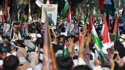 Unjuk rasa tersebut juga untuk mengungkap rasa solidaritas atas tewasnya pemimpin politik Hamas, Ismail Haniyeh. (merdeka.com/Imam Buhori)