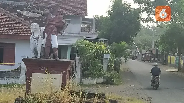 Patung PrabuTawangalun bersama seekor Macan Putih yang konon merupakan peliharaannya. di kawasan Desa Macan Putih yang dulunya merupakan area kerajaan Blambangan (Hermawan Arifianto/Liputan6.com)