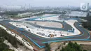 Foto udara suasana pembangunan Jakarta International E-Prix Circuit (JIEC) di kawasan Ancol, Jakarta, Rabu (11/5/2022). Pembangunan JIEC sudah mencapai 100 persen dan menyisakan pemasangan infrastruktur tambahan berupa grandstand dan jembatan penyeberangan yang ditargetkan selesai pada akhir pekan ketiga Mei. (Liputan6.com/Herman Zakharia)
