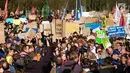Pelajar Belgia saat menggelar unjuk rasa masalah perubahan iklim di kantor Uni Eropa, Brussels, Belgia, Kamis (21/2). Aksi ini sudah berlangsung selama dua bulan. (Liputan6.com/HO/Arie Asona)