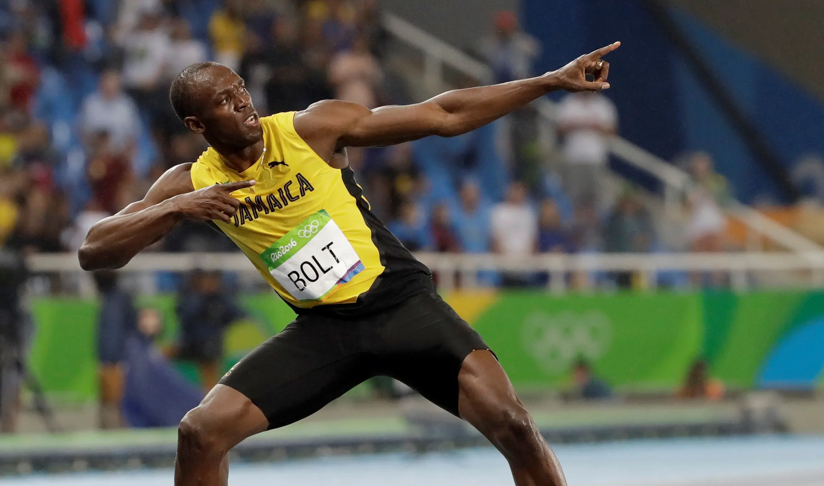 Pelari Jamaika, Usain Bolt, meraih medali emas pada nomor 200 meter Olimpiade Rio de Janiero 2016, Kamis (18/8/2016) atau Jumat pagi WIB. (AP Photo/David J. Phillip)