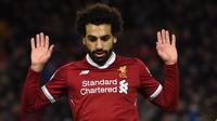 Mohamed Salah - Salah merupakan bintang sepak bola muslim yang dikenal taat dan rajin menjalankan ibadah puasa selama Ramadan. Bahkan Salah tetap menjalankan ibadah puasa saat tampil final Liga Champions 2018/19. (AFP/Paul Ellis)