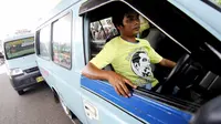 Menurut salah satu koordinator Pospera, Relawan Bis Kota dipersiapkan untuk mengajak masyarakat pengguna angkutan umum untuk memilih pasangan Jokowi-JK pada Pilpres 2014 mendatang, (29/5/2014). (Liputan6.com/Faizal Fanani)