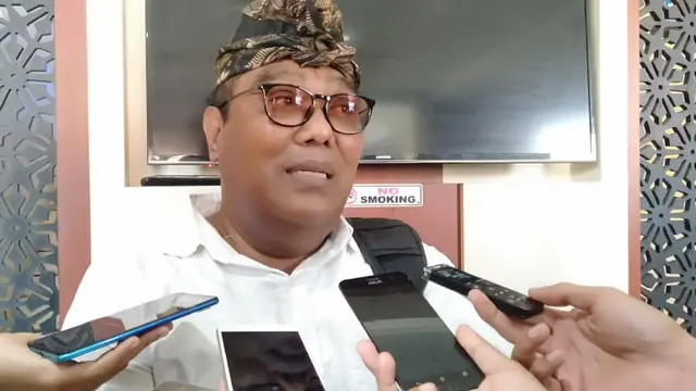 I Gusti Agung Ngurah Nyoman Juniartha ditemui di Polda Bali saat melaporkan Anggota DPD RI Arya Wedakarna