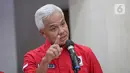 Gubernur Jawa Tengah Ganjar Pranowo memberikan keterangan usai dipanggil di DPP PDIP, Jakarta, Senin (24/10/2022). Gubernur Jawa Tengah (Jateng) Ganjar Pranowo menegaskan bahwa dirinya akan taat terhadap aturan Partai PDI Perjuangan (PDIP) soal Capres 2024. (Liputan6.com/Faizal Fanani)