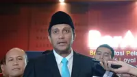 Wakil Menteri Hukum Eddy Hiariej usai acara penyambutan Kementerian Hukum, di Graha Pengayoman, Jakarta Selatan, Senin (21/10/2024). (Liputan6.com/Khofifah)