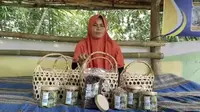 Ibad Badriah, ketua kelompok wanita Motekar klaster usaha kerupuk Daun Bambu, di kampung Tangan-Tangan RT 02, Desa Bongas, Kecamatan Cililin, Kabupaten Bandung Barat.