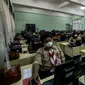 Suasana pelaksanaan Asesmen Nasional  Berbasis Komputer (ANBK) 2021 di SMK 15, Jakarta, Rabu (22/9/2021). ANBK  SMK  digelar 20-23 September 2021 dengan mematuhi protokol kesehatan dan ANBK merupakan pengganti Ujian Nasional (UN). (Liputan6.com/Johan Tallo)