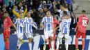 Para pemain Leganes merayakan gol ke gawang Real Madrid pada laga La Liga di Stadion Municipal Butarque, Senin (15/4). Kedua tim bermain imbang 1-1. (AP/Bernat Armangue)