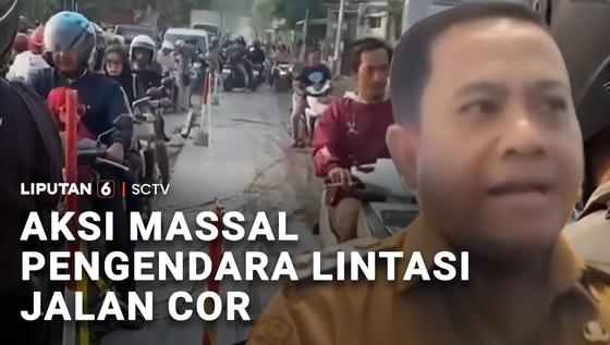 Aksi Massal Pengendara Lintasi Jalan Cor