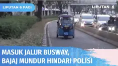 Panik melihat Polantas yang berjaga, sejumlah pengendara nekat lawan arus di jalur busway di Kawasan Kramat Raya. Bahkan sopir bajaj nekat berjalan mundur untuk menghindari razia.