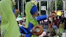 Ibu Negara Hj. Mufidah Jusuf Kalla (kedua kanan) saat menghadiri pembukaan Muhammadiyah Expo 2015 di kawasan Monas Jakarta, Kamis (28/5/2015). Kegiatan tersebut merupakan rangkaian kegiatan pendukung Muktamar Muhammadiyah ke-47. (Liputan6.com/Johan Tallo)