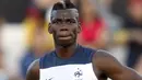 Gelandang Timnas Perancis, Paul Pogba, tampil dengan rambut berwarna saat berlaga di Piala Dunia 2014. (REUTERS/Sergio Perez) 