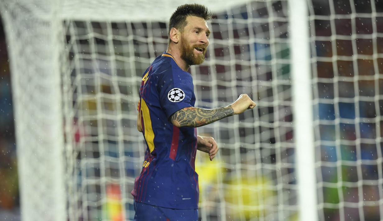 1. Lionel Messi (Barcelona) - 12 Gol (1 Penalti). (AFP/Lluis Gene)