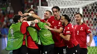 Pemain Georgia merayakan gol yang mereka cetak ke gawang Portugal dalam laga terakhir Grup F Euro 2024 di Arena AufSchalke, Gelsenkirchen, Kamis (27/6/2024) dini hari WIB. (
