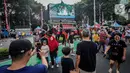 Polisi berkuda yang bersiaga di kawasan tersebut pun menjadi primadona. Banyak warga yang antusias berfoto-ria bersama mereka. (Liputan6.com/Faizal Fanani)