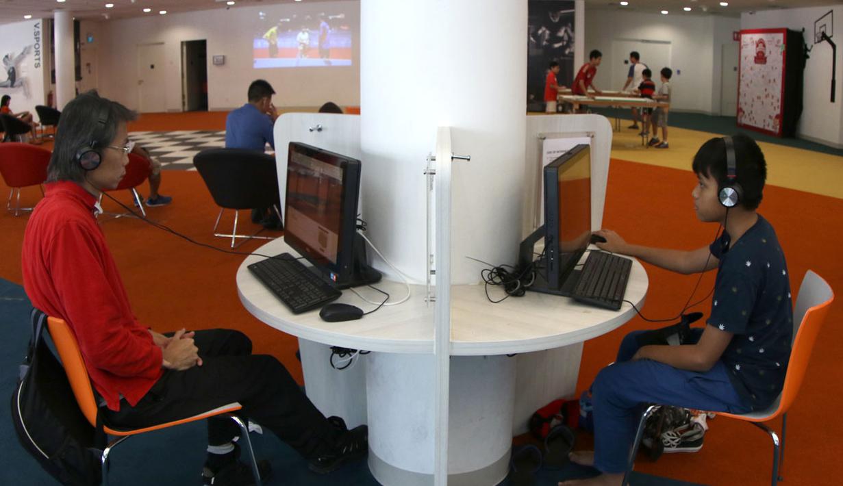 Fasilitas audio visual juga tersedia di Perpustakaan Olah Raga Singapura yang terletak di Pusat Olah Raga Singapura (Singapore Sports Hub). (Bola.com/Arief Bagus)