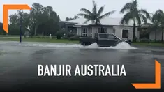 Ribuan warga Queensland, Australia terpaksa mengungsi karena permukiman mereka terenda banjir akibat derasnya curah hujan.