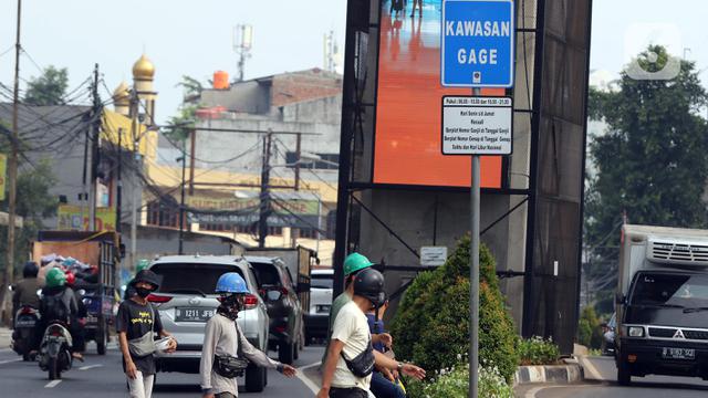 FOTO: PPKM Level 2, Sistem Ganjil Genap di Jakarta Diperluas