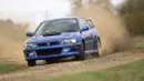 Subaru Impreza WRX 22B STI dibuat pada tahun 1997 untuk merayakan tiga kali kemenangan Subaru di ajang World Rally Championship (WRC) di era 1990an. Tenaganya ditingkatkan dari versi WRX STI biasa. Mesinnya memiliki kapasitas 2.200cc 4-silinder boxer bertenaga 280 Hp yang disalurkan ke empat roda melalui transmisi manual 5-percepatan. Mobil ini hanya diproduksi sebanyak 400 unit di seluruh dunia. (Source: caranddriver.com)