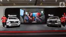Model berdiri samping mobil Mitsubishi New Xpander pada Jakarta Auto Week (JAW) 2022 di booth Mitsubishi Motors JCC, Jakarta, Selasa (15/3/2022). PT Mitsubishi Motors Krama Yudha Sales Indonesia (MMKSI) menghadirkan line-up unggulan Mitsubishi Motors sebagai unit display. (Liputan6.com/Fery Pradolo)