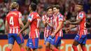 Penyerang Atletico Madrid, Julian Alvarez (kedua kanan) merayakan golnya pada pertandingan Liga Spanyol 2024/2025 melawan Valencia CF di stadion Metropolitano, Madrid pada 15 September 2024. (Pierre-Philippe MARCOU/AFP)