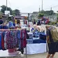 Salah satu lapak pasar tumpah di Jalan Sejajar Rel, Kecamatan Pancoran Mas, Kota Depok (Liputan6.com/Dicky Agung Prihanto)