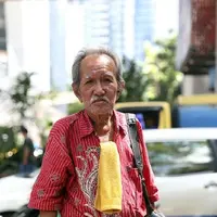 Kisah Kakek Tukang Foto Keliling yang Viral di Media Sosial  | foto : Nurwahyunan