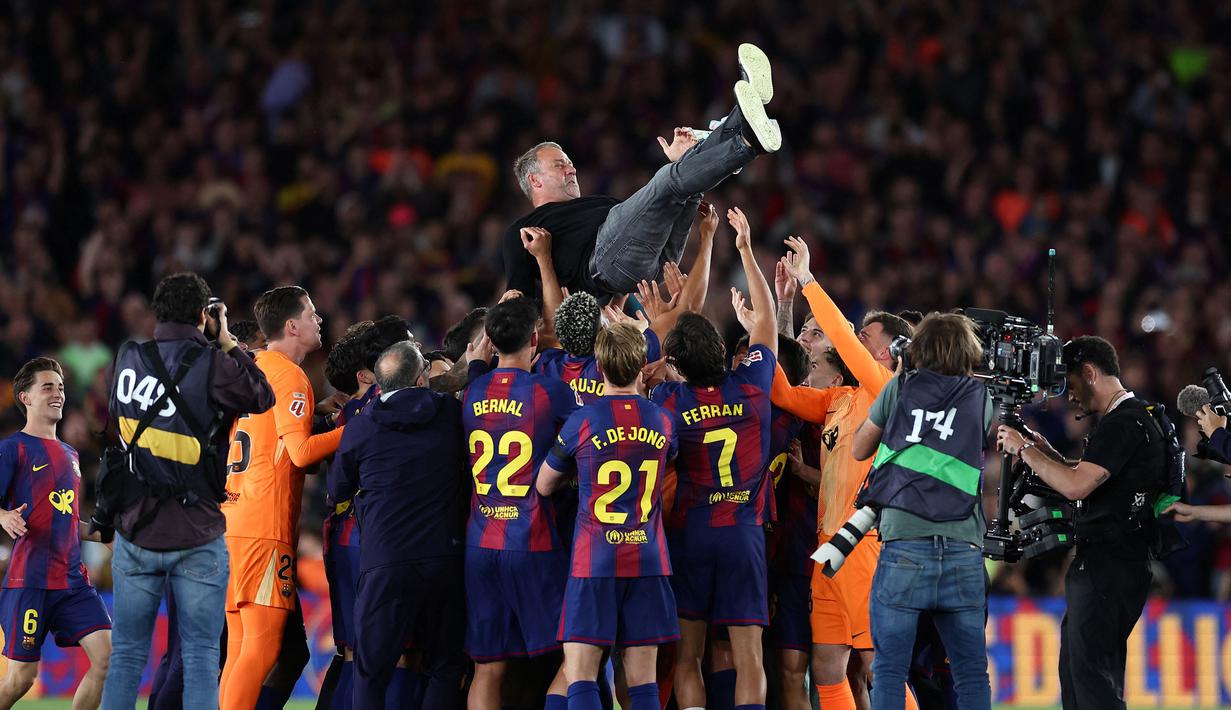 Ini menjadi gelar Liga Spanyol back-to-back bagi Barcelona dan pelatih Hansi Flick. (AFP/Josep Lago)