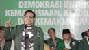 Ketua Umum PKB, Muhaimin Iskandar alias Cak Imin menyampaikan pidato politik sebelum menuju Gedung KPU RI, Jakarta, Minggu (18/2). Pidato tersebut bertemakan demokrasi untuk kemanusiaan, keadilaan dan kemakmuran. (Liputan6.com/Faizal Fanani)