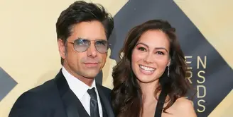 Tunangan (yang kini sudah jadi istri) John Stamos. Caitlin McHugh dirampok beberapa hari sebelum pernikahannya.  (JEAN-BAPTISTE LACROIX/AFP/Getty Images)
