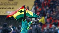 Bek Senegal, El Hadji Malick Diouf, merayakan kemenangan timnya usai pertandingan final Piala Afrika (AFCON) antara Senegal dan Maroko di Stadion Prince Moulay Abdellah, Rabat, pada 18 Januari 2026. (Abdel Majid BZIOUAT / AFP)